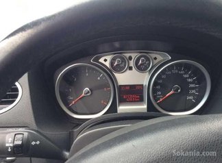 Ford focus ghia 4porte,noire exelente état.