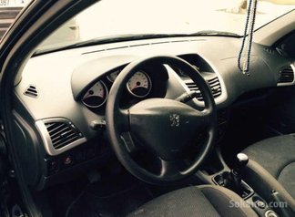 Peugeot 206+ essence tout options 2011
