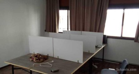 Bureau au RDC en face du arribat center, 2 facades