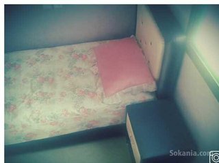 Lit d'une place