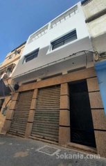 Magasin avec appartement arrière-magasin
