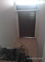 Magasin avec appartement arrière-magasin