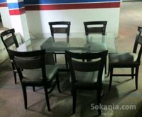 Salle à manger en verre avec 6 chaise en bois
