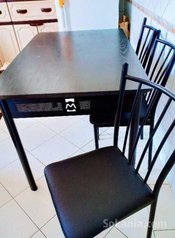 Table à manger avec 6 chaises en cuir et acier